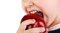 Healthy baby teeth bite ripe red apple Royalty Free Stock Photo