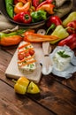 Healthy baguette, spread curd cheese with vegetable and herbs