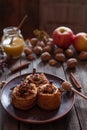 Healthy baked apples stuffed with nuts raisins and cinnamon sticks