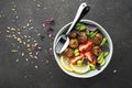 A healthy, balanced, healthy diet. Meat balls, tomatoes, rice, cucumbers, soy beans, spinach, lemon, bowl. Top View. Royalty Free Stock Photo