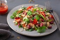 Healthy bean and quinoa salad with spinach, chili