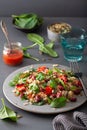 Healthy bean and quinoa salad with spinach, chili