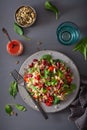 Healthy bean and quinoa salad with spinach, chili