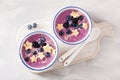 Healthy berry smoothie bowl with banana and sesame seed Royalty Free Stock Photo