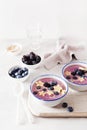 Healthy berry smoothie bowl with banana and sesame seed Royalty Free Stock Photo