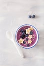 Healthy berry smoothie bowl with banana and sesame seed Royalty Free Stock Photo