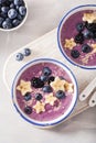 Healthy berry smoothie bowl with banana and sesame seed Royalty Free Stock Photo