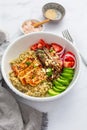 Healthy bowl with cauliflower rice, enoki mushrooms, chicken and vegetables Royalty Free Stock Photo