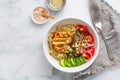 Healthy bowl with cauliflower rice, enoki mushrooms, chicken and vegetables Royalty Free Stock Photo
