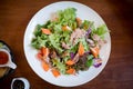 Healthy bowl of homemade salad with fresh vegetables, crab stick and tuna Royalty Free Stock Photo