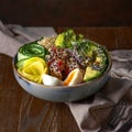 Healthy bowl - quinoa salad with tuna, broccoli, avocado on wooden rustic table Royalty Free Stock Photo
