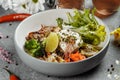 Healthy bowl - quinoa salad with tuna, broccoli, avocado on wooden rustic table. top view Royalty Free Stock Photo