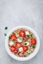 Healthy Bowl Salad with Quinoa, Mozzarella Cheese, Tomatoes and Basil Royalty Free Stock Photo