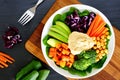 Healthy bowl with super-foods on slate background