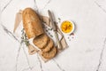 Healthy bread with spicy olive oil and vintage knife Royalty Free Stock Photo
