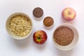 Healthy breakfast - apples, chia seeds, cinnamon, grains