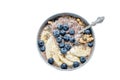 Healthy breakfast berry smoothie bowl topped with banana, granola, Blueberries and chia seeds with copy space Royalty Free Stock Photo