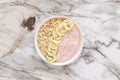 Healthy breakfast berry smoothie bowl topped with banana, muesli and chia seeds. Top view. Royalty Free Stock Photo