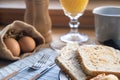 Healthy breakfast, boiled eggs, toast bread and orange juice, close up view Royalty Free Stock Photo