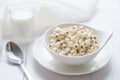 Healthy breakfast with boiled job`s tears porridge in white bowl