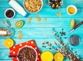 Healthy breakfast with bowl of cereal, orange juice, granola, milk, jam and fruits on blue wood background. Balanced diet. Royalty Free Stock Photo