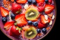 Healthy breakfast bowl with fresh berries - strawberries, blueberries, kiwi and almonds, balanced diet nutrient-rich, close-up