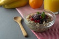 Healthy breakfast in a bowl with oatmeals, frozen berries, fresh strawberries, mint. Oat porridge with fruits Royalty Free Stock Photo