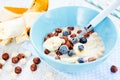 Healthy breakfast - cereal chocolate balls with milk, berries an