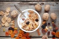 Healthy breakfast: cereal wheat flakes with milk in bowl.