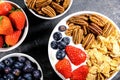 Healthy Breakfast of Cereals With Fresh Fruit and Nuts Royalty Free Stock Photo