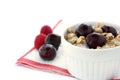 Healthy Breakfast with Cereals, Yogurt, Cherries and Raspberries in White Bowl Royalty Free Stock Photo