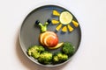 Healthy breakfast for children, creative ideas from fruit and vegetables, vitamins on plate Royalty Free Stock Photo