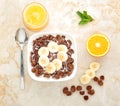 Healthy Breakfast - chocolate cereal with banana Royalty Free Stock Photo