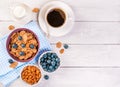 Healthy breakfast, coffee cornflakes berries and milk, with text space top view close-up Royalty Free Stock Photo