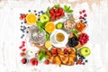 Healthy breakfast coffee, croissants, muesli, berries, fruits Royalty Free Stock Photo