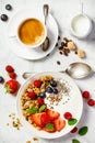 Healthy breakfast with coffee, yogurt, granola and berries Royalty Free Stock Photo
