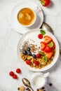 Healthy breakfast with coffee, yogurt, granola and berries Royalty Free Stock Photo