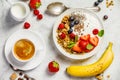 Healthy breakfast with coffee, yogurt, granola and berries Royalty Free Stock Photo