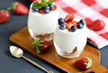 Healthy Breakfast Concept. Muesli with Greek Yogurt, Strawberries and Blueberries, Diet, Summer Food. Black Background, Close-up, Royalty Free Stock Photo