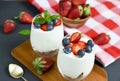 Healthy Breakfast Concept. Muesli with Greek Yogurt, Strawberries and Blueberries, Diet, Summer Food. Black Background, Close-up, Royalty Free Stock Photo