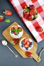 Healthy Breakfast Concept. Muesli with Greek Yogurt, Strawberries and Blueberries, Diet, Summer Food. Black Background, Close-up, Royalty Free Stock Photo