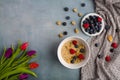 Healthy breakfast concept with oat flakes and fresh berries on rustic background. muesli. strawberries, blueberries Royalty Free Stock Photo