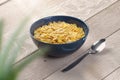 Bowl with cornflakes on wood breakfast