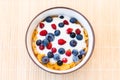 Healthy breakfast  - Cornflakes with bilberries, raspberries and yogurt Royalty Free Stock Photo