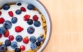 Healthy breakfast  - Cornflakes with bilberries, raspberries and yogurt Royalty Free Stock Photo