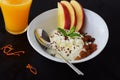 Healthy breakfast: cottage cheese with flax seeds, raisins, fresh apples and a glass of fresh orange juice. Healthy