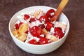 Healthy breakfast, cottage cheese with fruit strawberry and banana with wooden spoon. Organic natural diet concept. Royalty Free Stock Photo