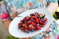 Healthy breakfast a plate with lowering cholesterol food- oatmeal porridge with fresh berries and nuts