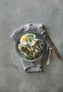 Breakfast with avocado toast, fried egg and salad, copy space Royalty Free Stock Photo