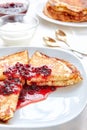 Healthy breakfast with fresh hot pancakes with berry jam